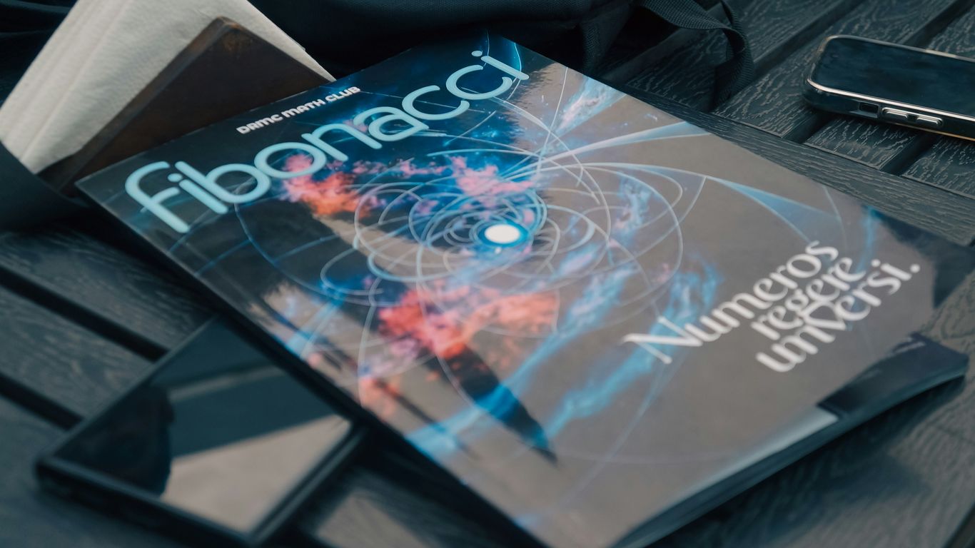 A book sitting on top of a wooden table