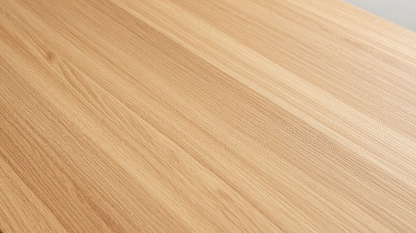 Oak laminate kitchen worktop with realistic wood grain texture.