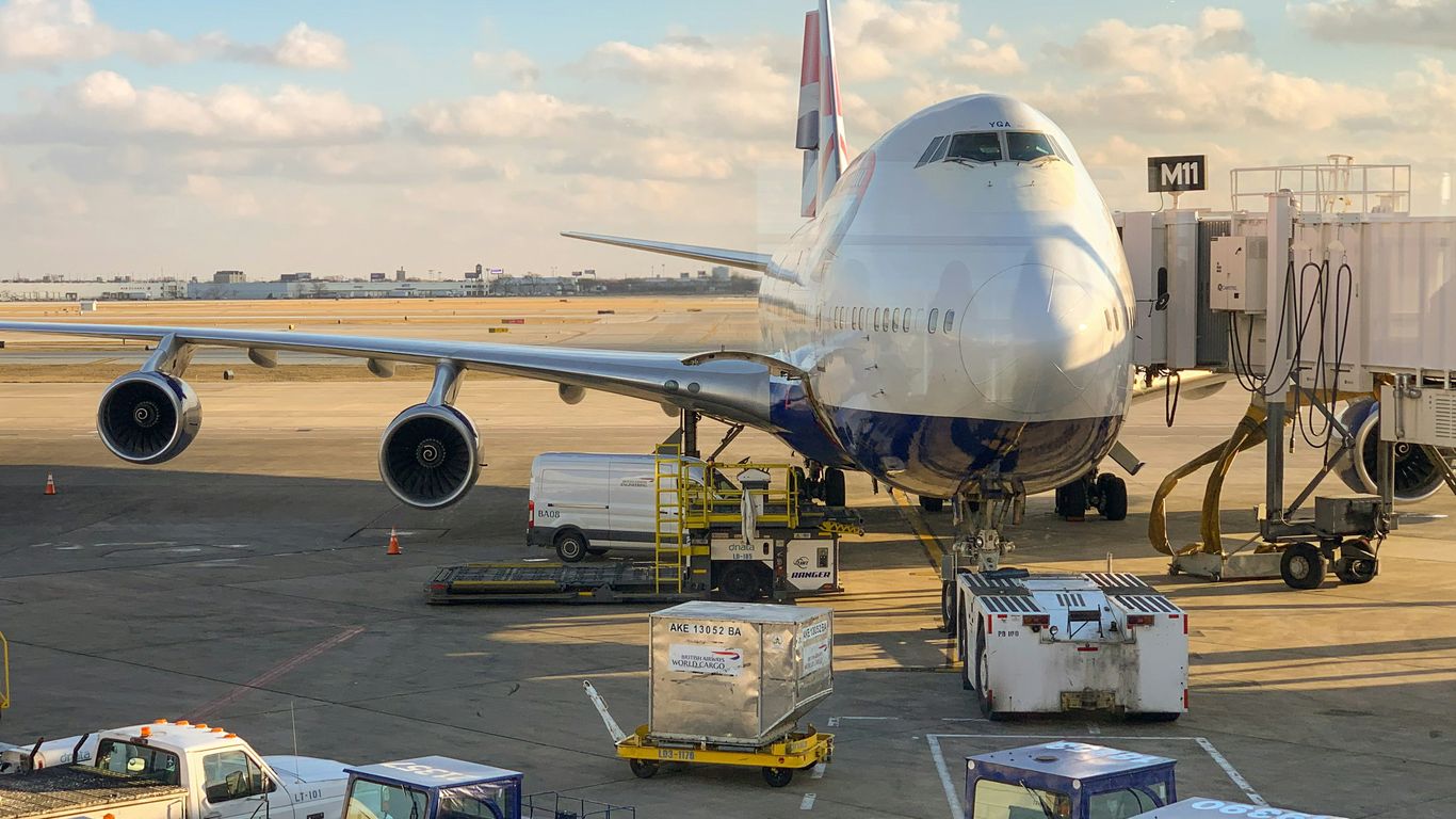 Courier carrying urgent shipment through airport