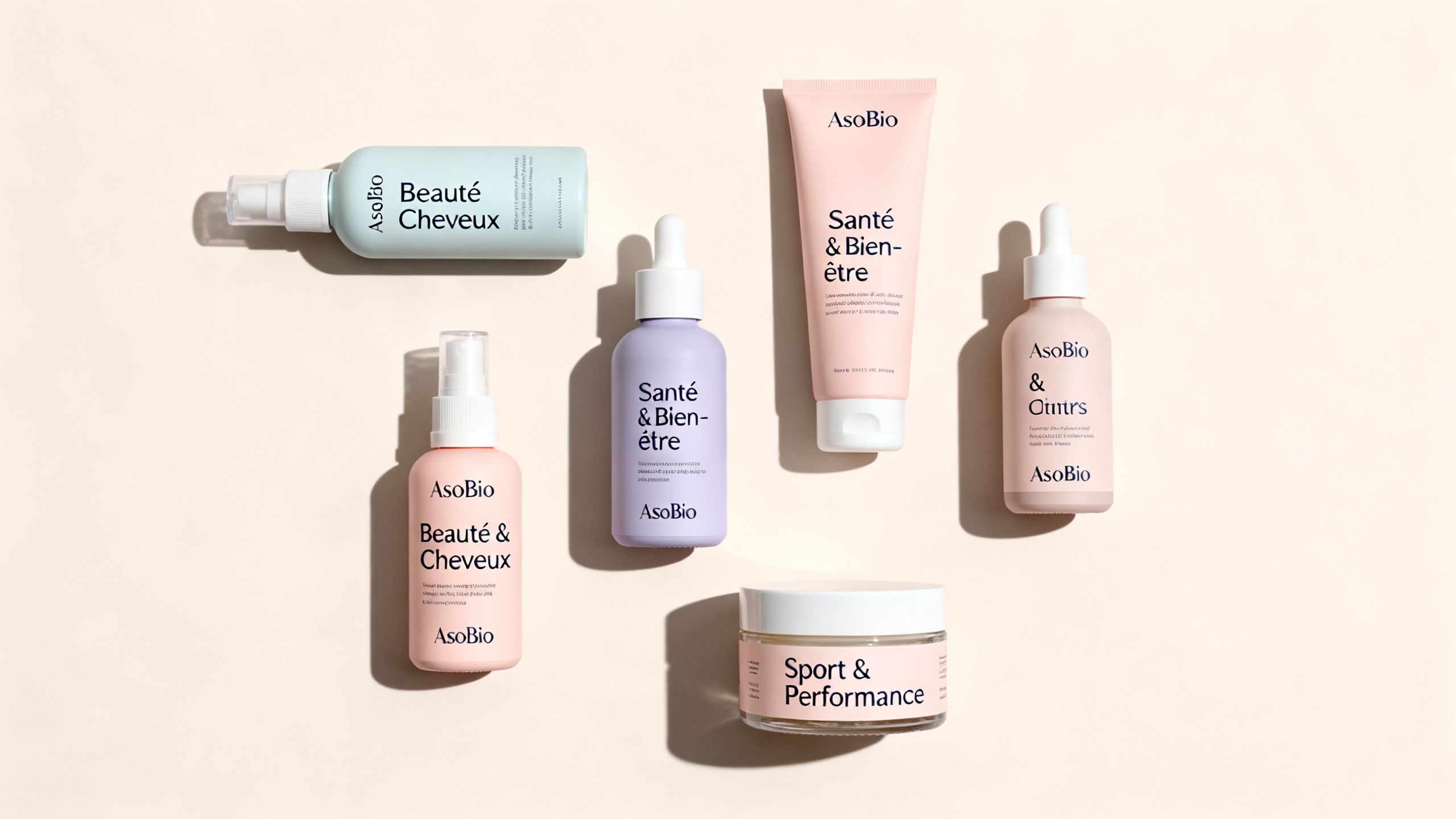 An elegant flat lay of AslBio's product lines, clearly labeled for 'Beauté & Cheveux', 'Santé & Bien-être', and 'Sport & Performance'.