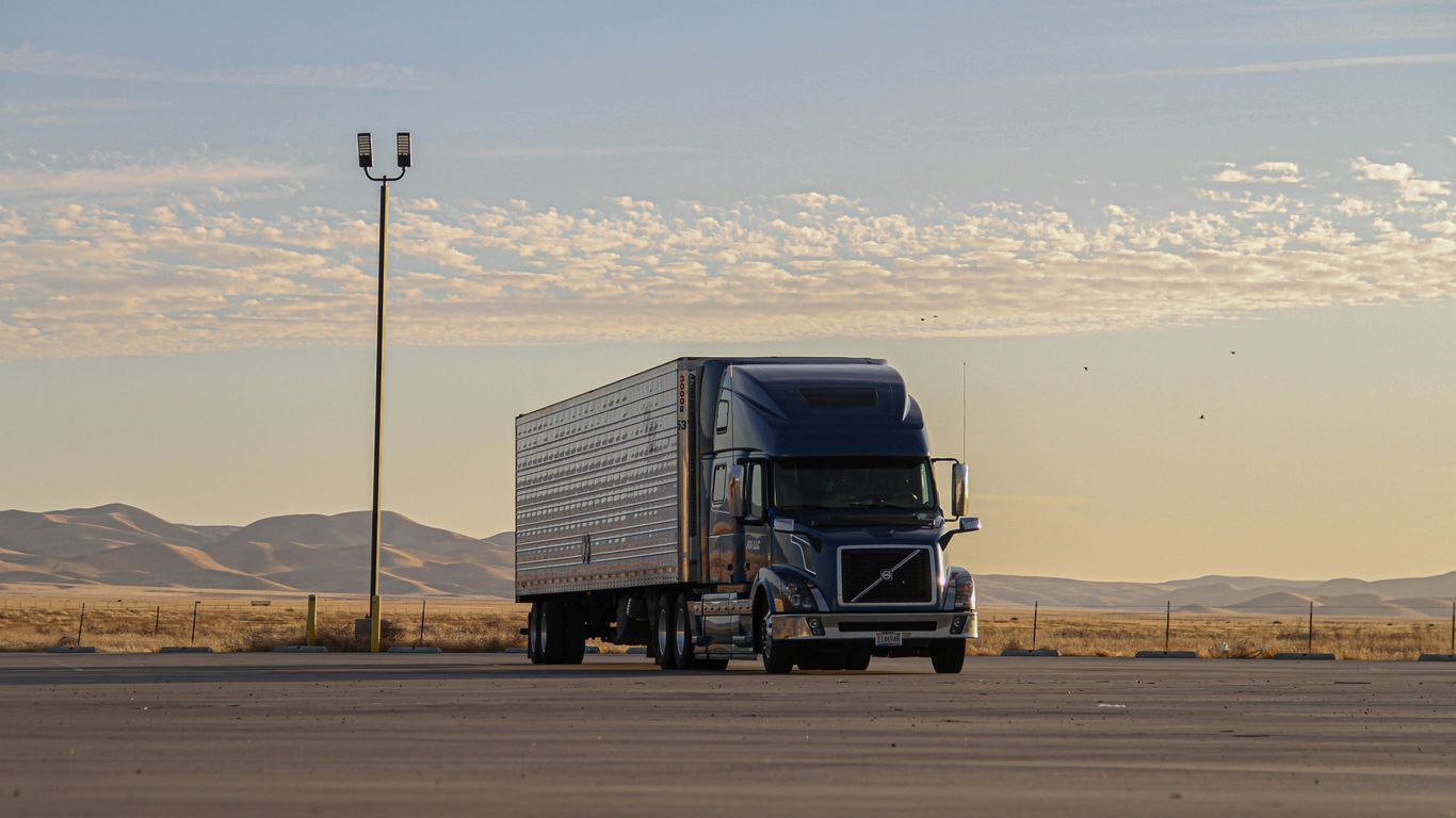 Freight operator reviewing digital shipment data