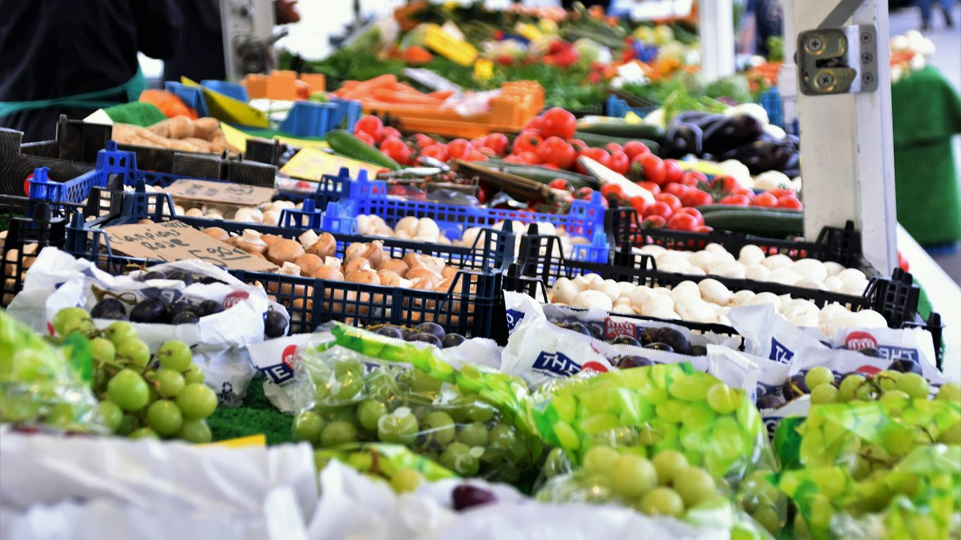 Fresh produce stalls inside the busy wet market