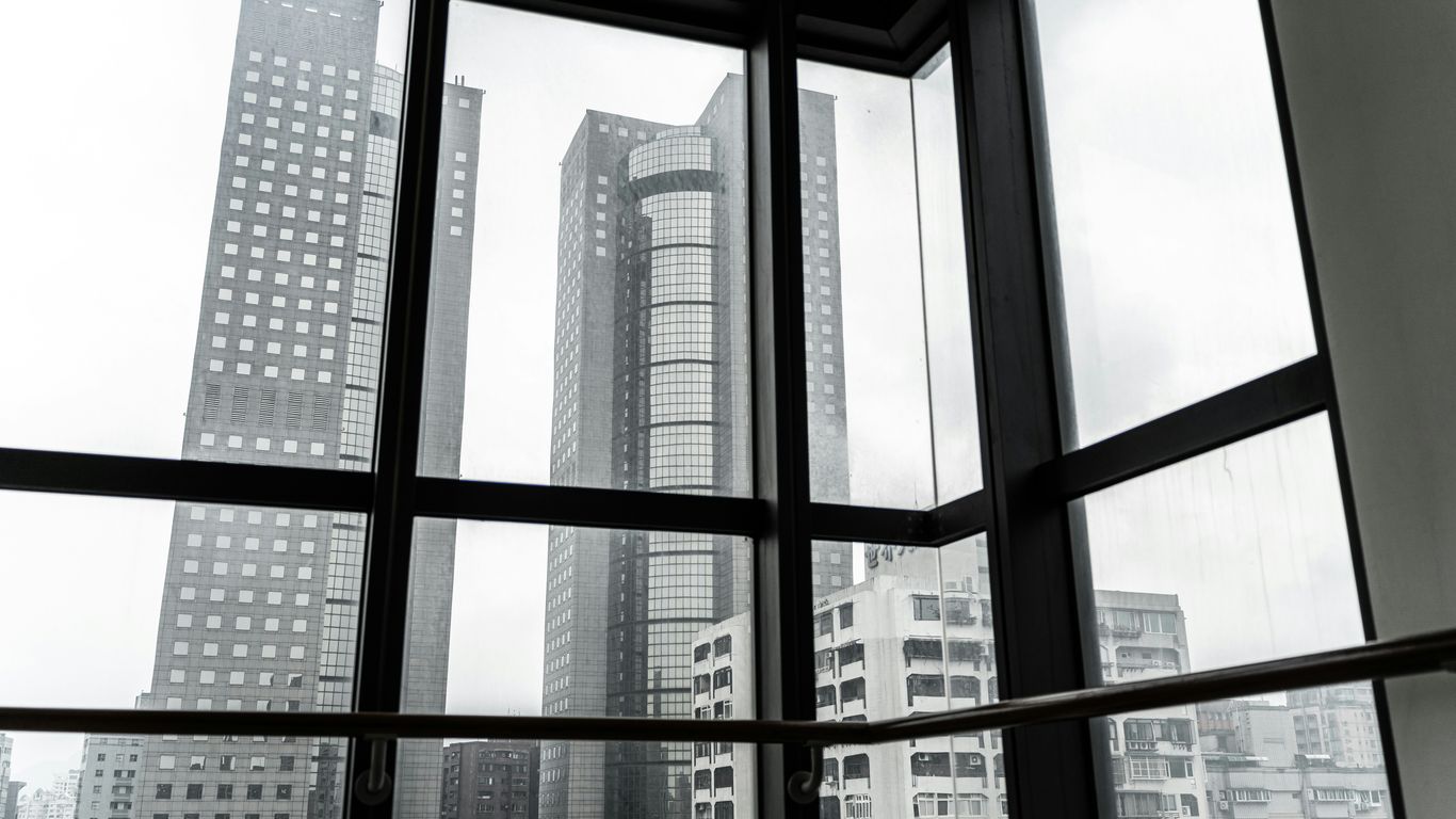 Modern skyscrapers seen through large windows
