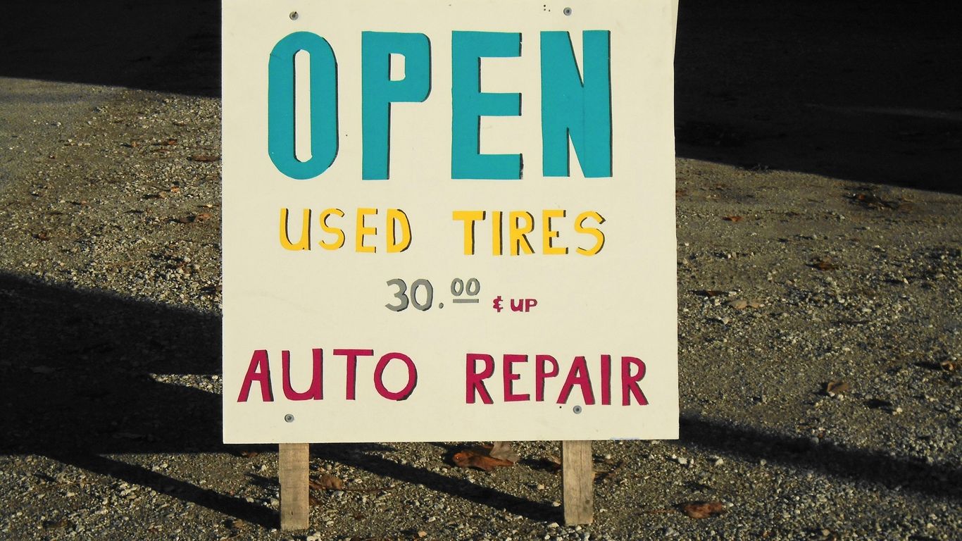 a sign that is on the side of a road