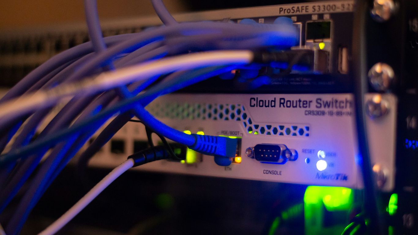 A collection of network infrastructure routers and server cables