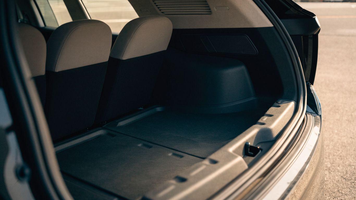 Cargo mat fitted across a clean vehicle trunk floor