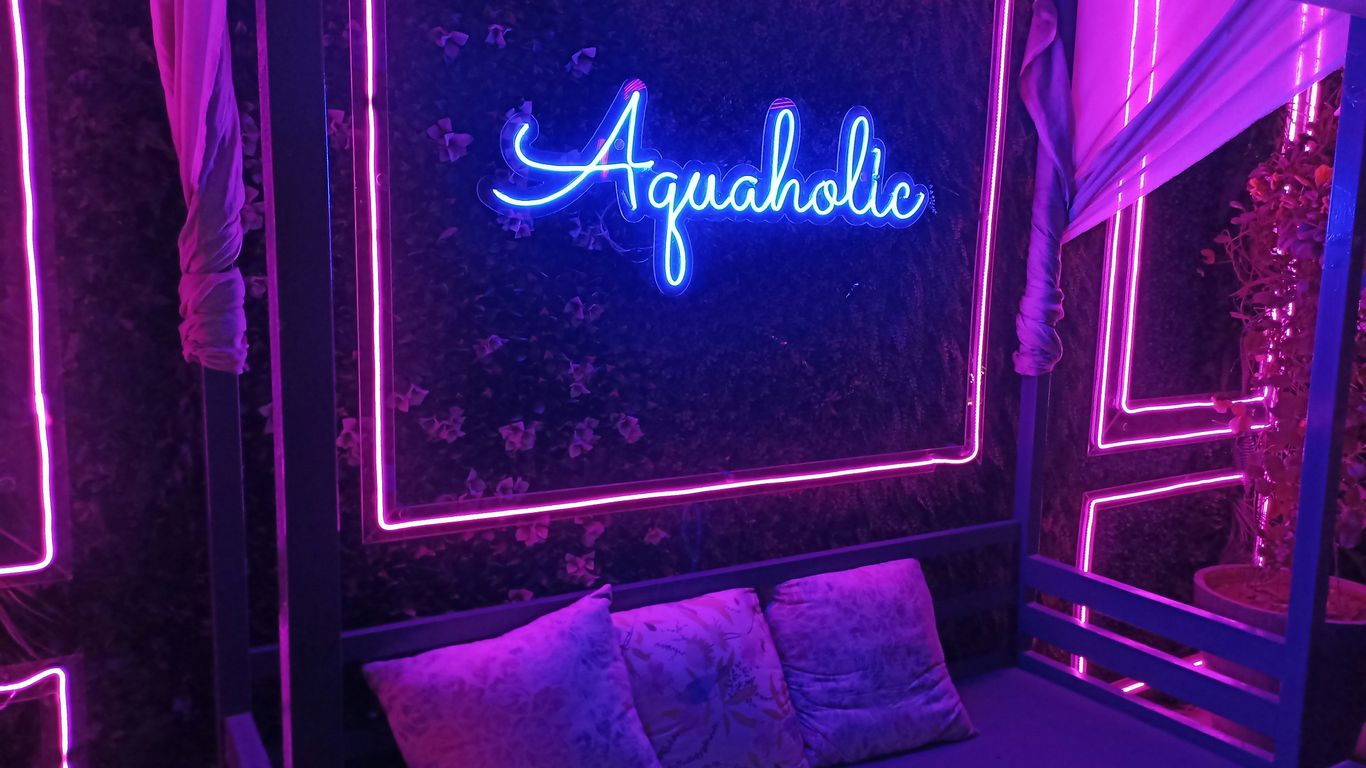 a bed with a sign on it