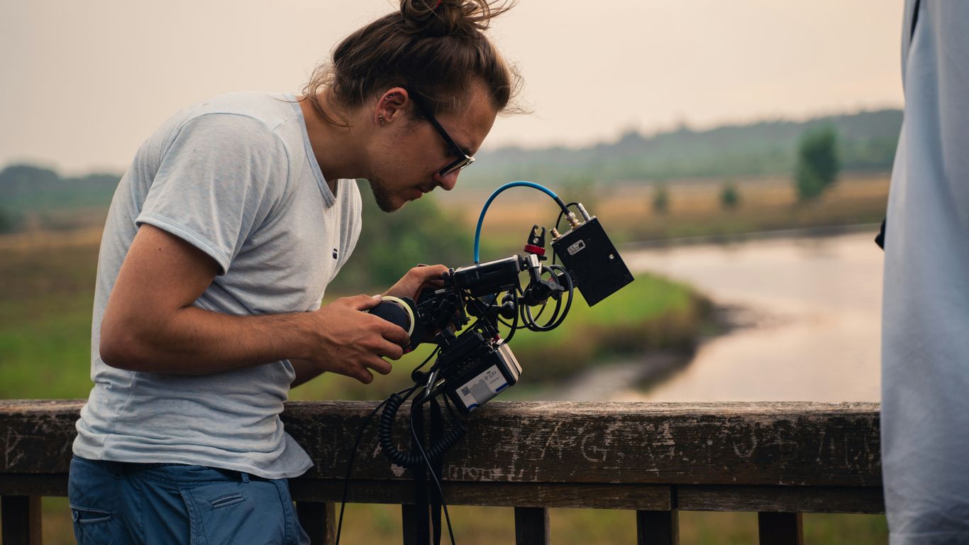 Professional videographer filming commercial content in Palm Beach