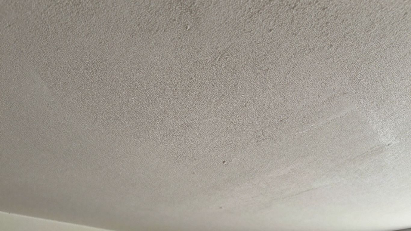 Textured Artex ceiling surface close-up