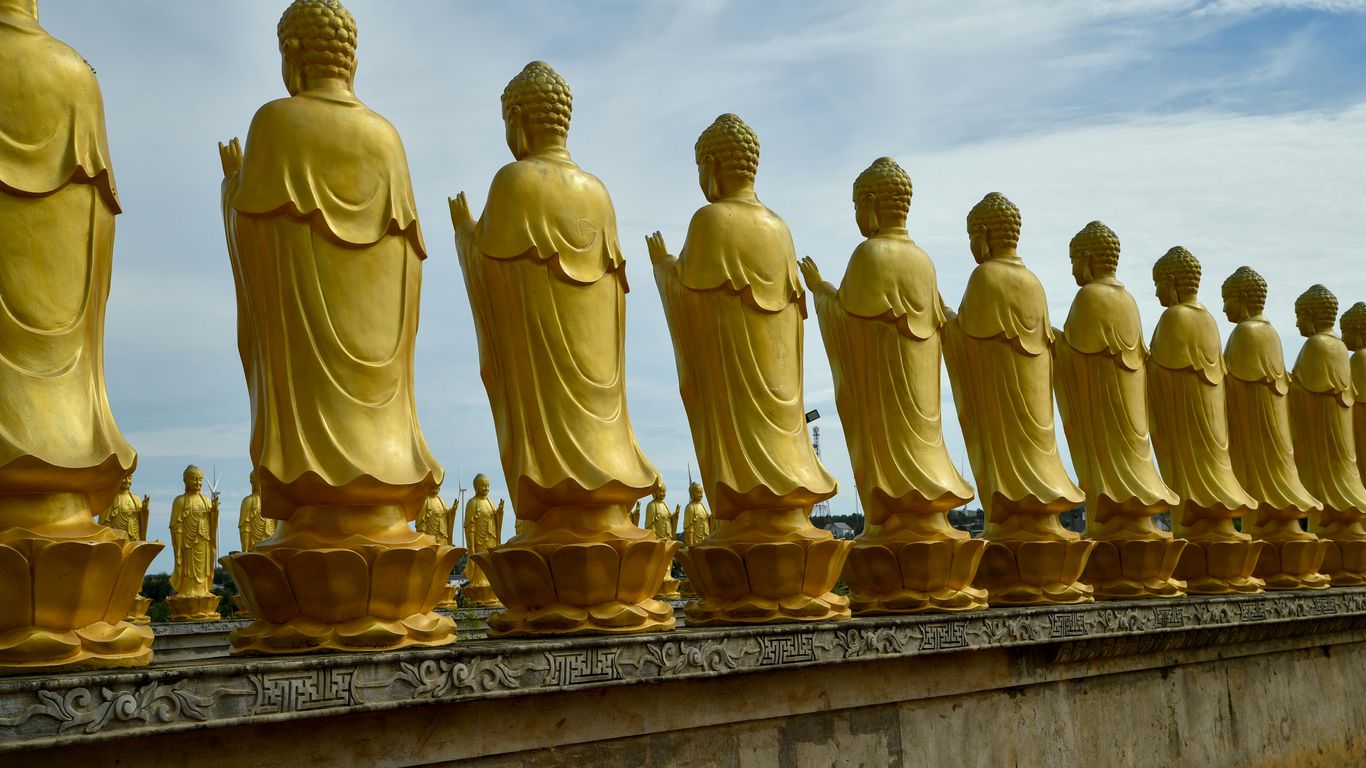 Golden statues in hall