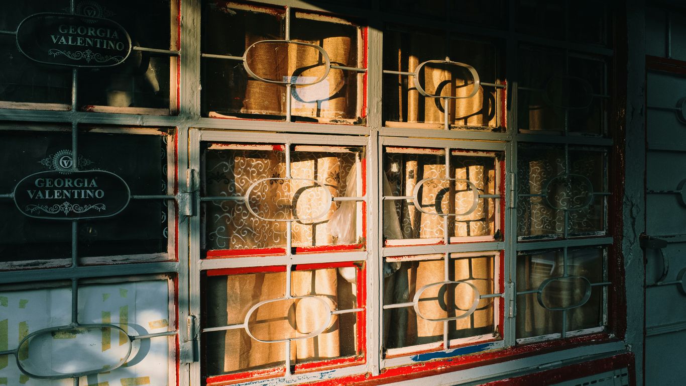 a store front with a lot of windows on it