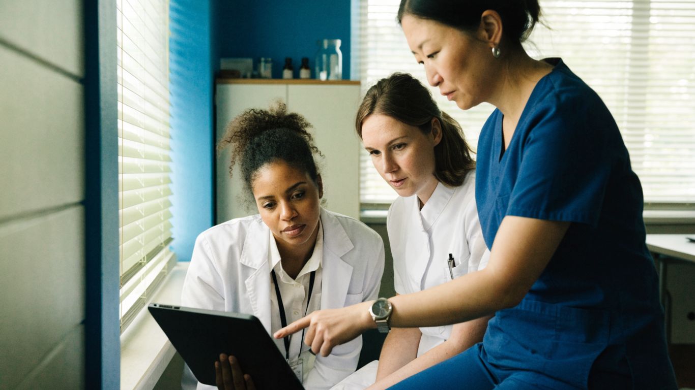 Care team reviewing follow-up workflow together
