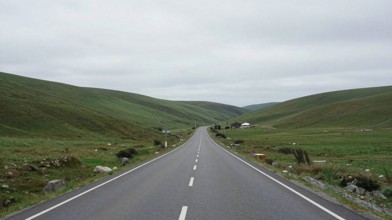 Street view landscape with distant mountains