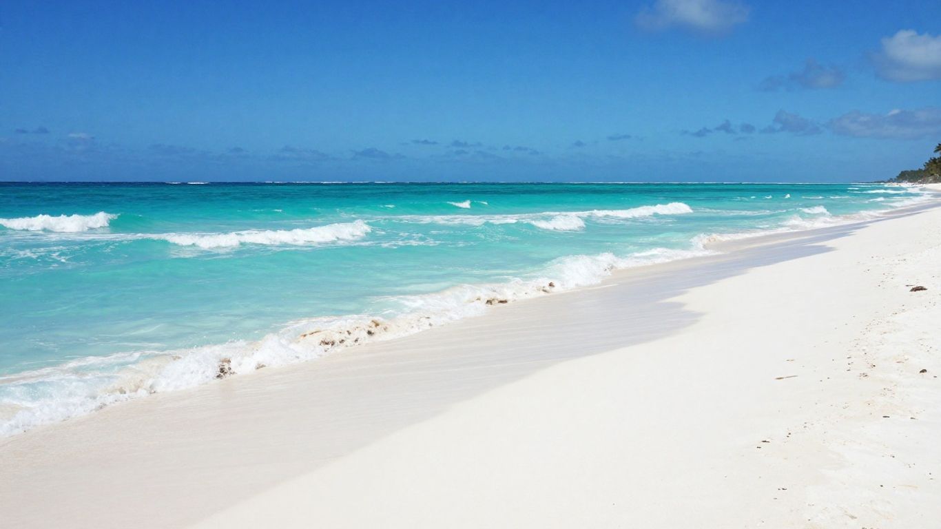 Pristine white sand beach in tropical sunlight