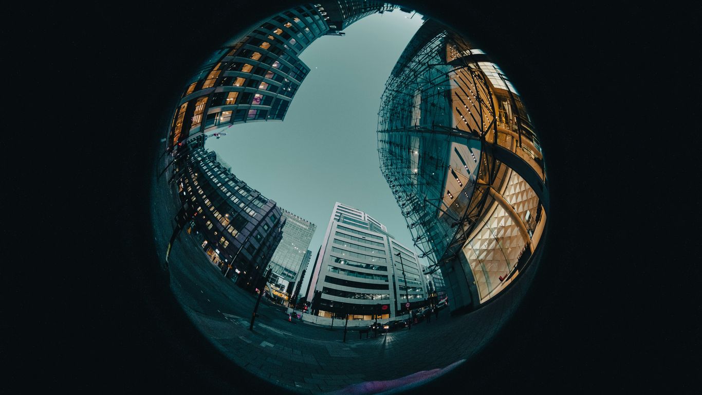 a fish eye view of a city at night