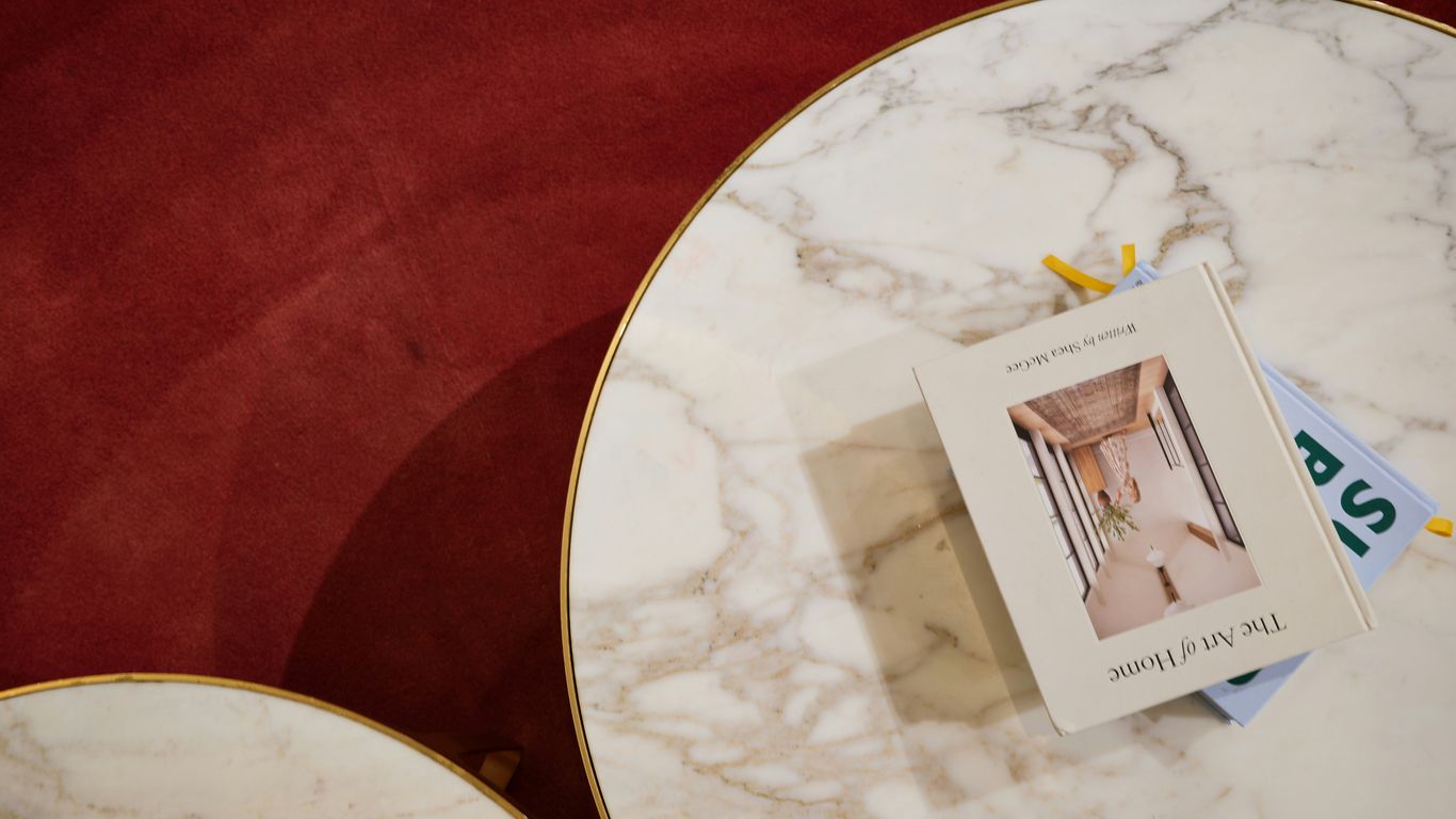 Round marble coffee table in modern interior