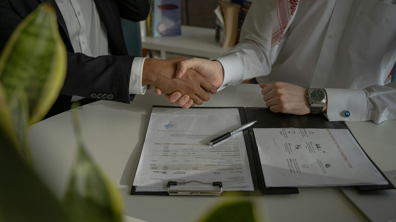 Business partners discussing contract details