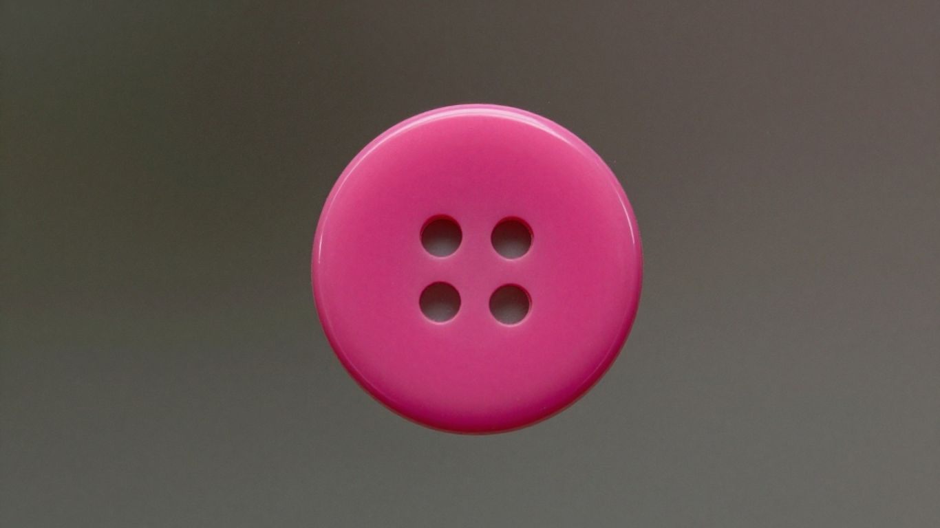Brightly colored button against a muted background.