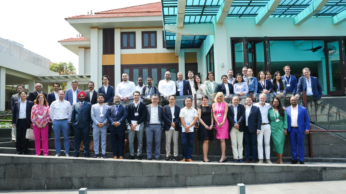 A large group of people standing outside a building.