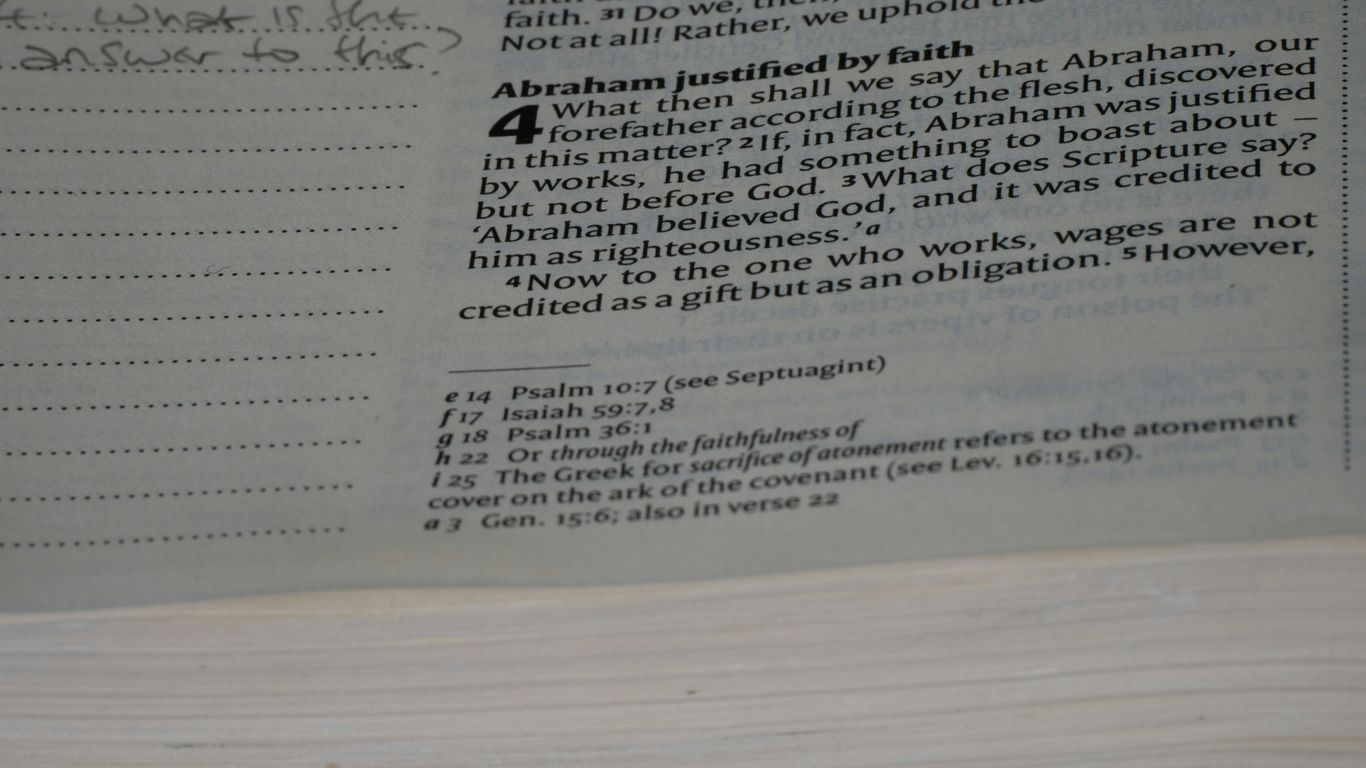 A close up of a book with writing on it