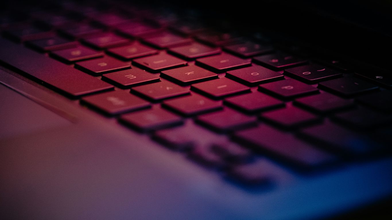 A person searching for digital partnerships on a laptop