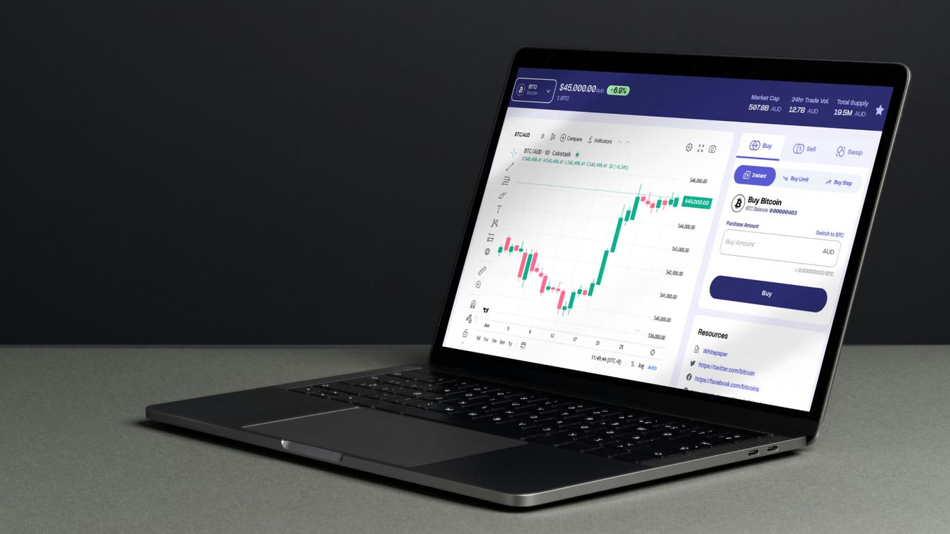 a laptop computer sitting on top of a table