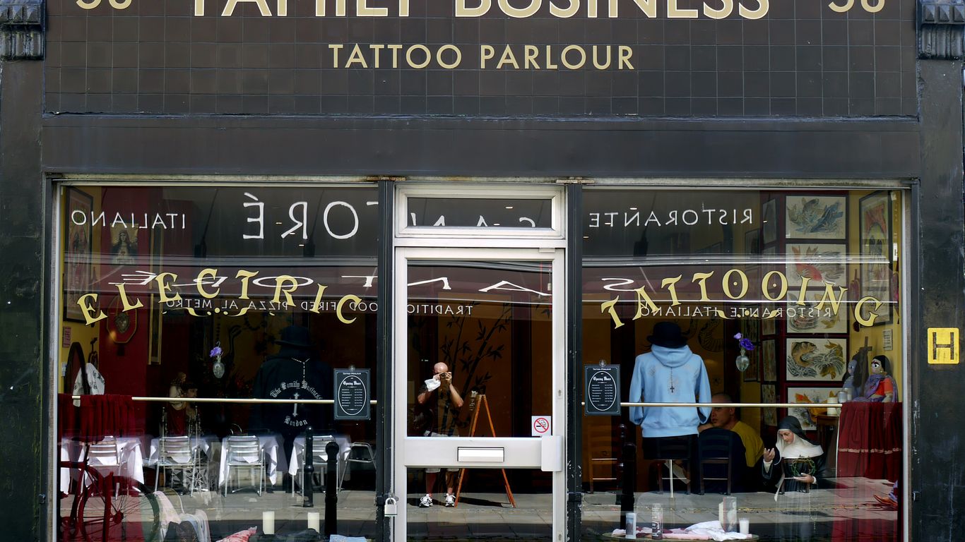A shop front display showing bright LED signage