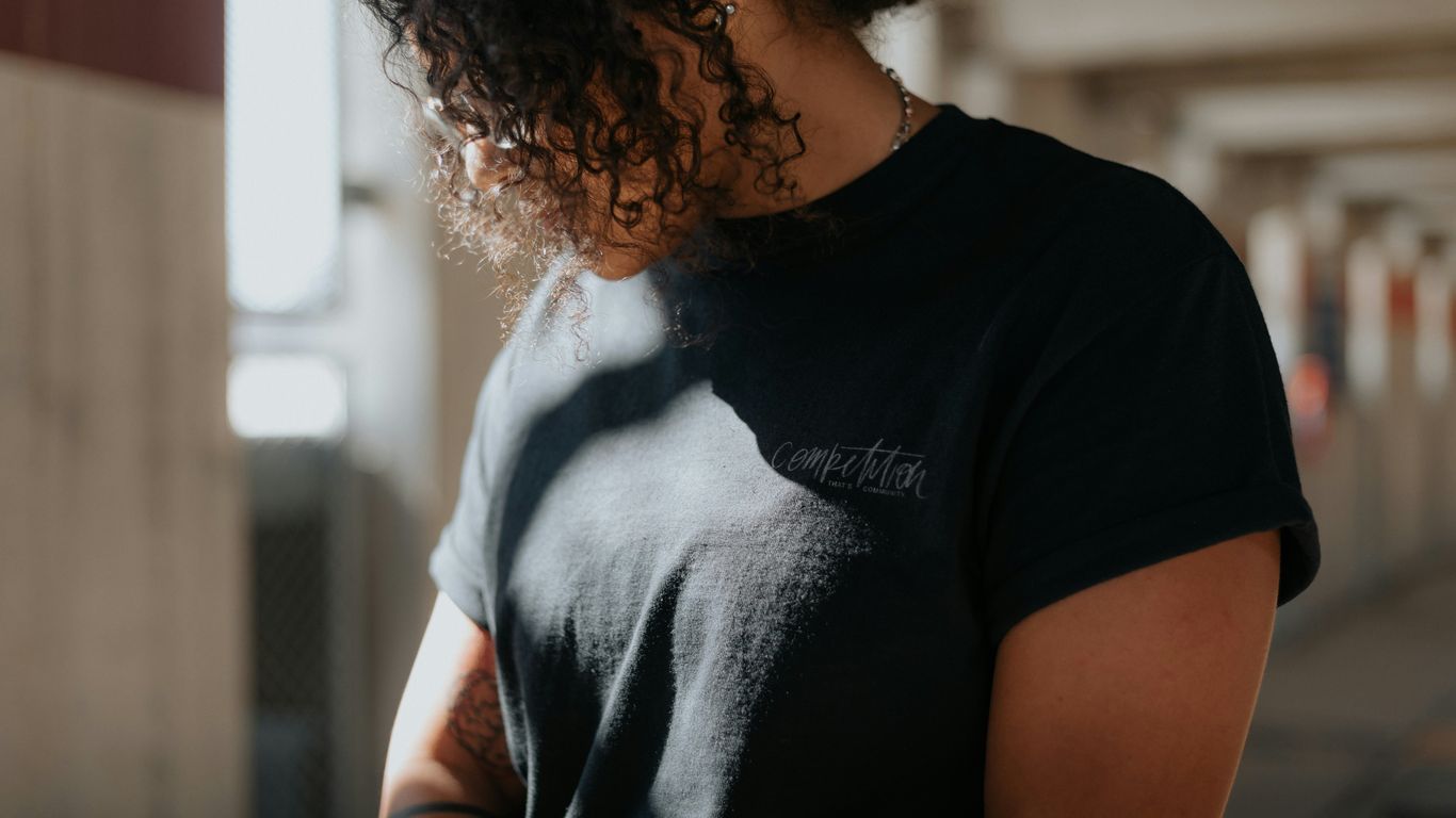 woman in black and white crew neck t-shirt