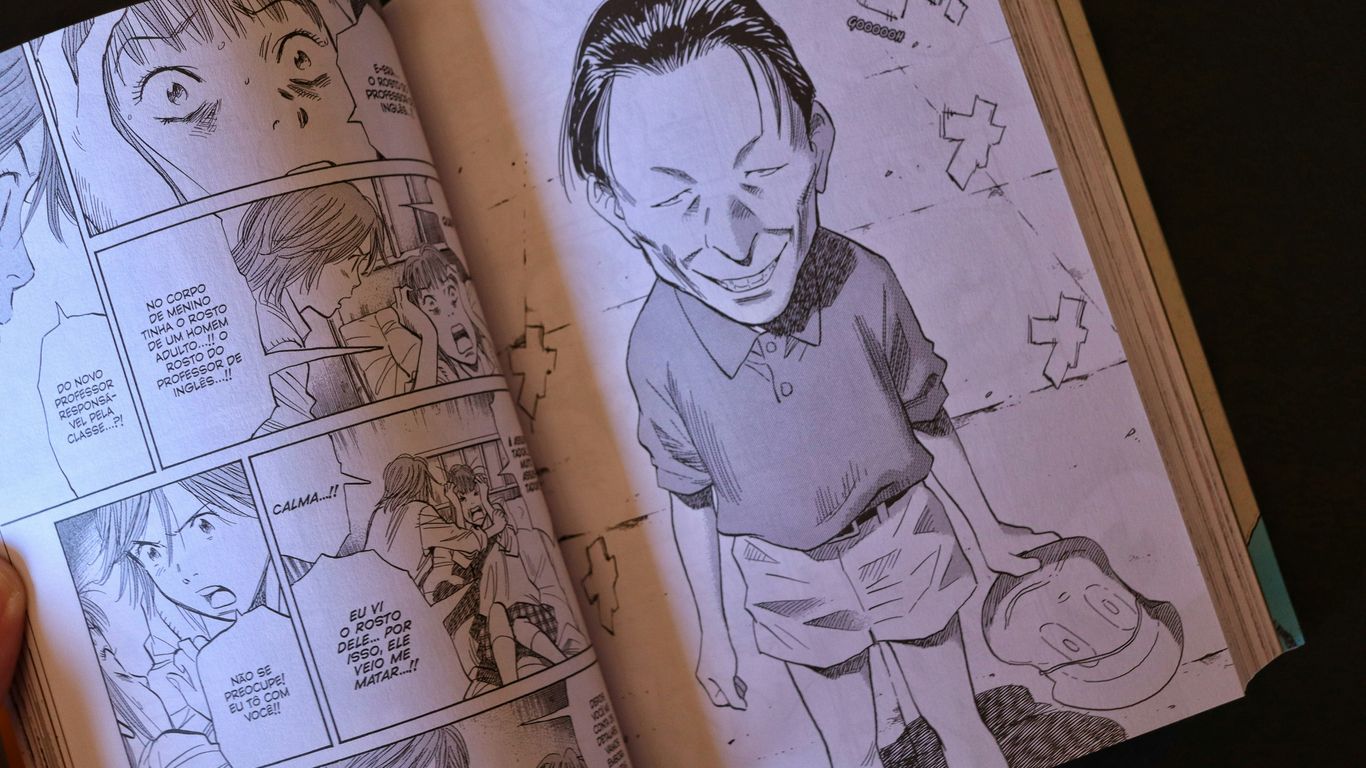 Manga panel showing a man with exaggerated features.