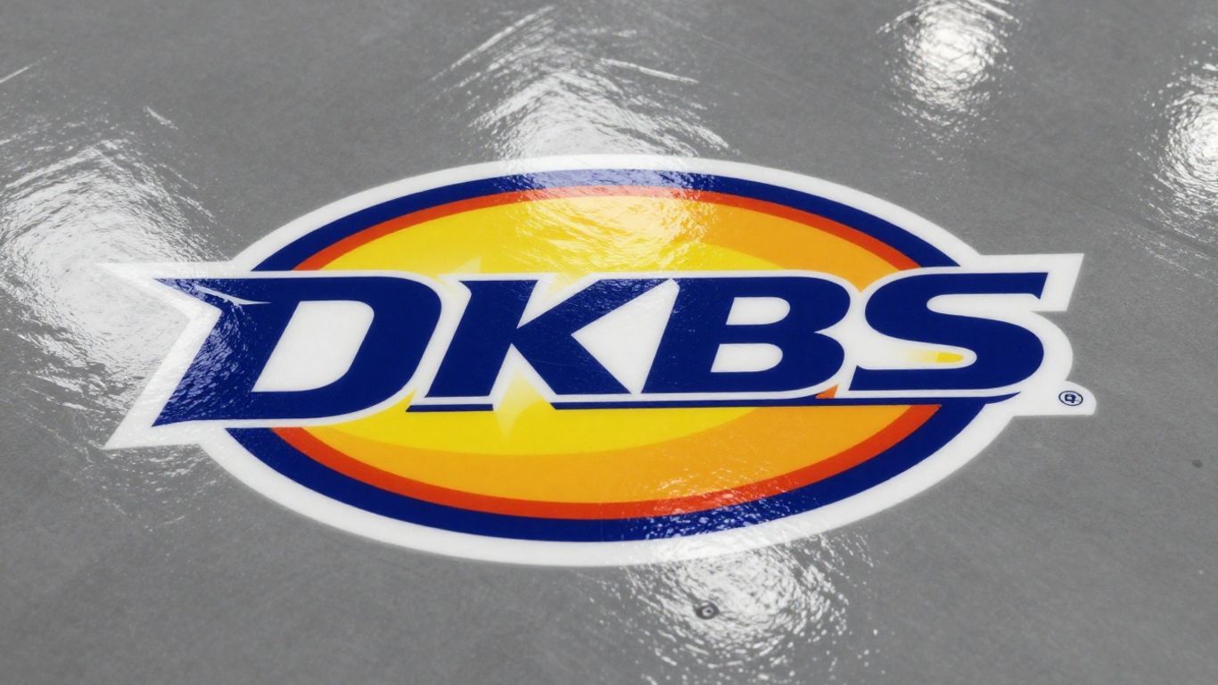 Custom logo embedded in glossy epoxy flooring.