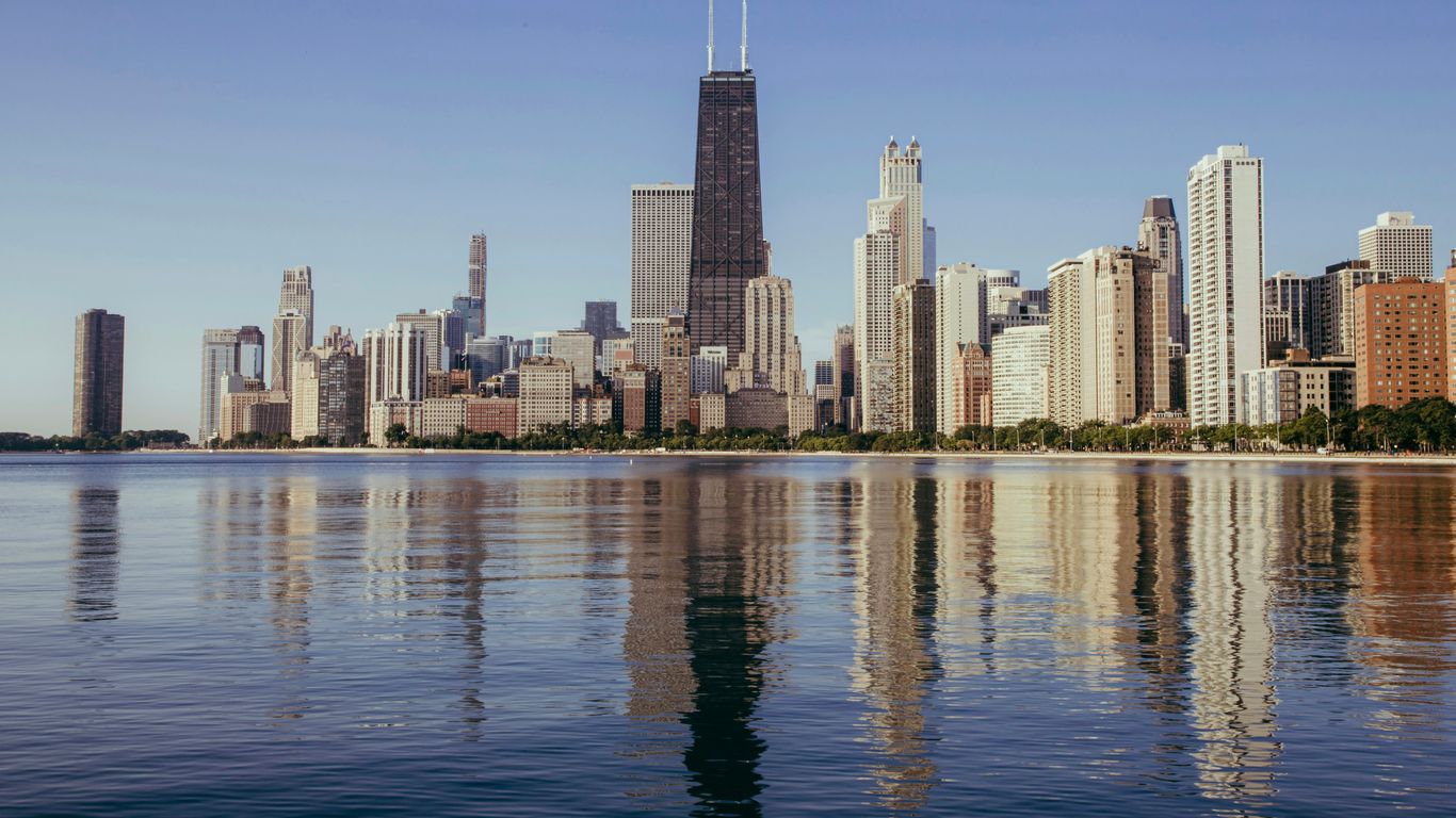body of water near buildings at daytime