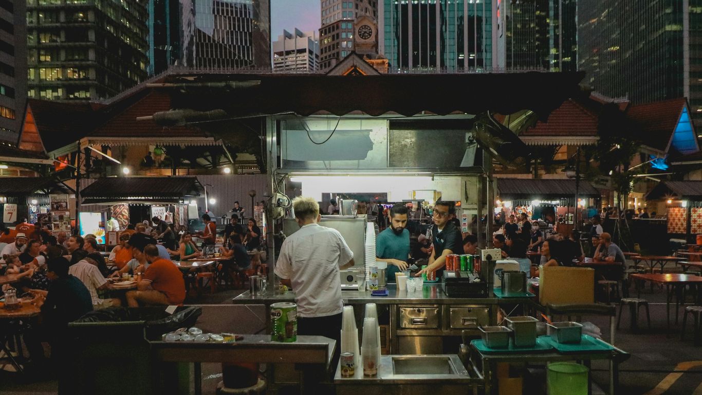 people standing in front of store during daytime
