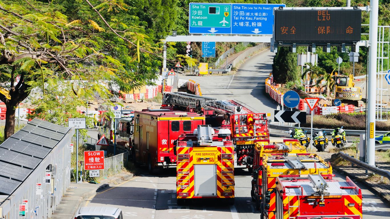 Emergency vehicles respond to an accident on a highway.
