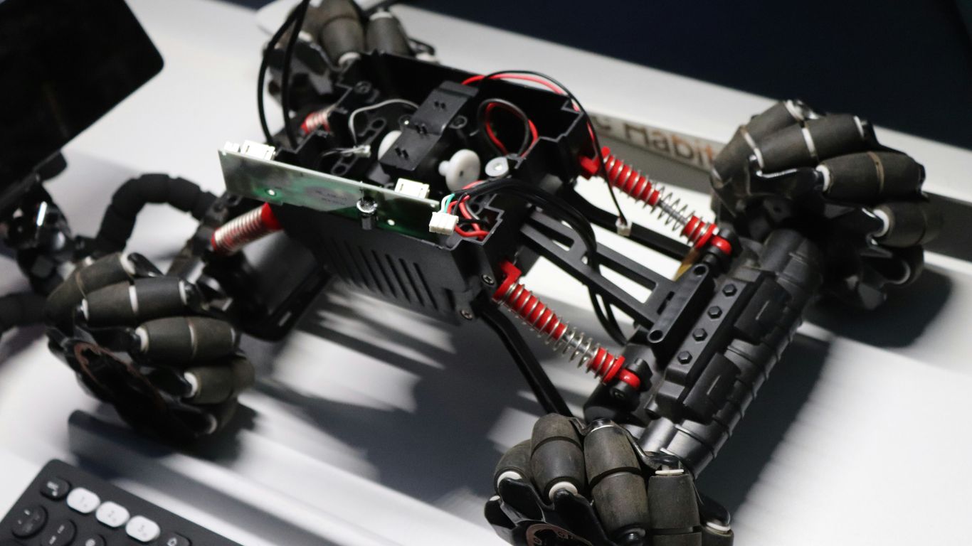 black and green robot toy