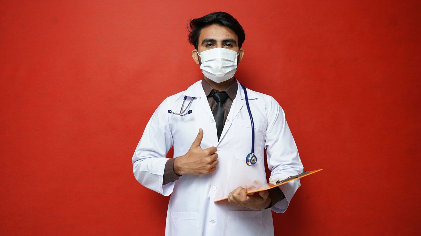 a doctor holding a clipboard