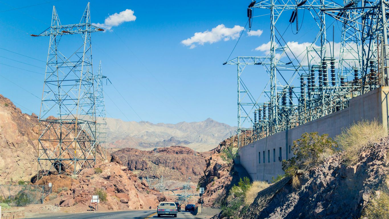 vehicle on roadway near mountains