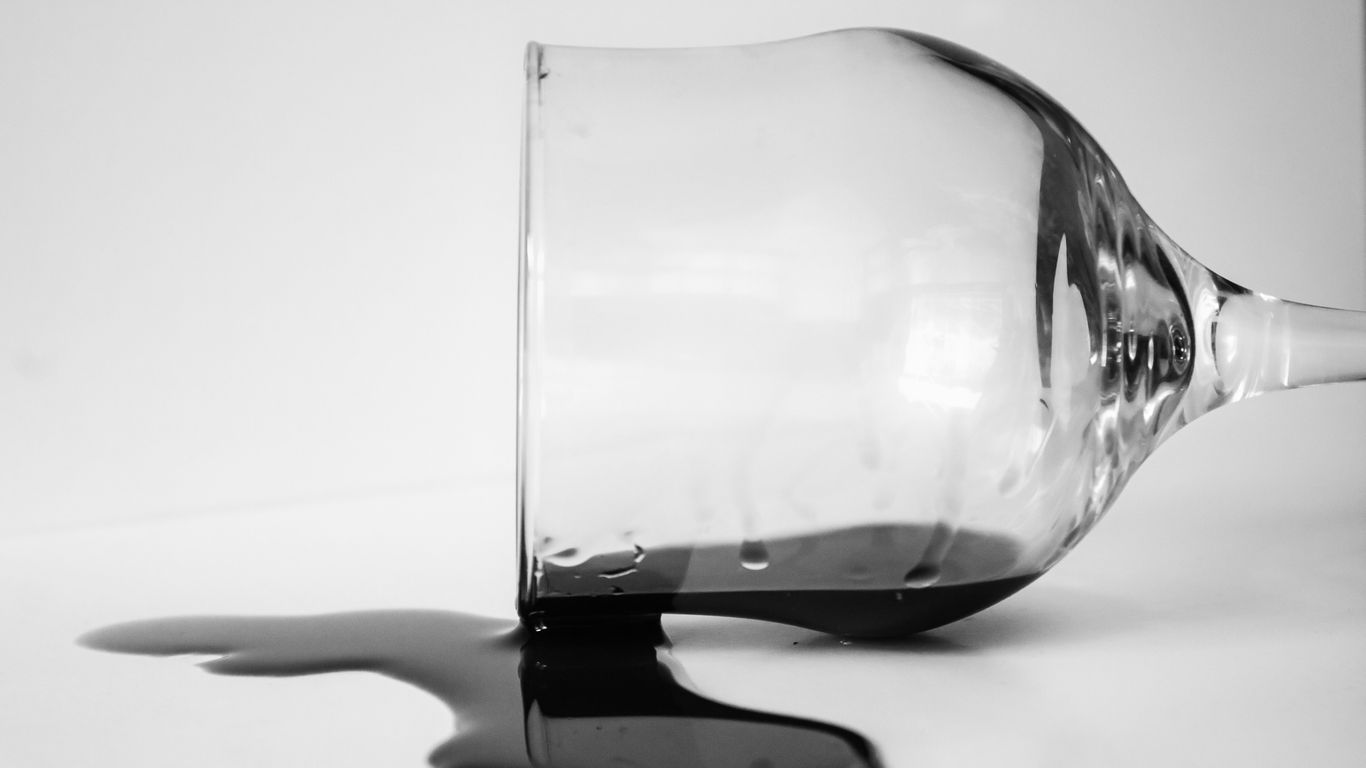 Blotting a spill from a marble tabletop