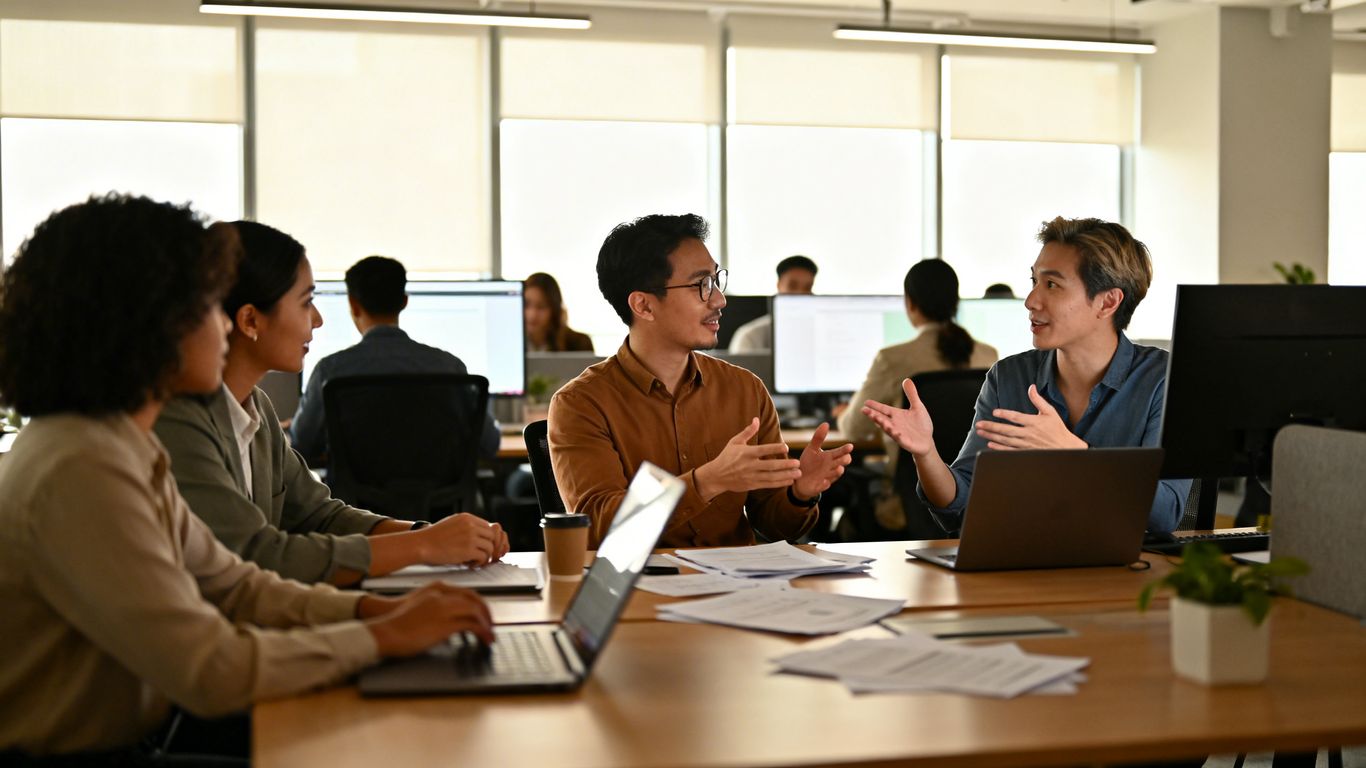 Employees communicating during a crisis.