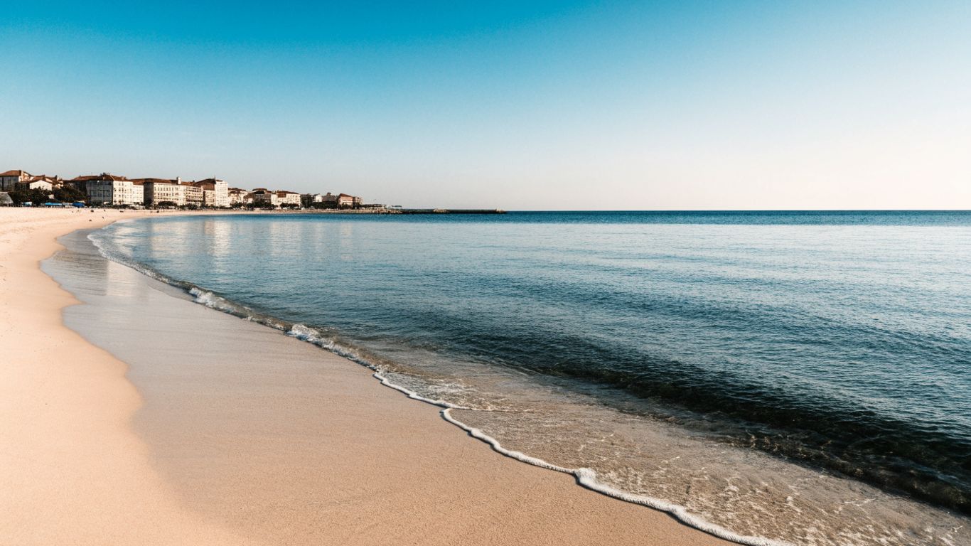 Pesaro’s sandy shoreline beside the town