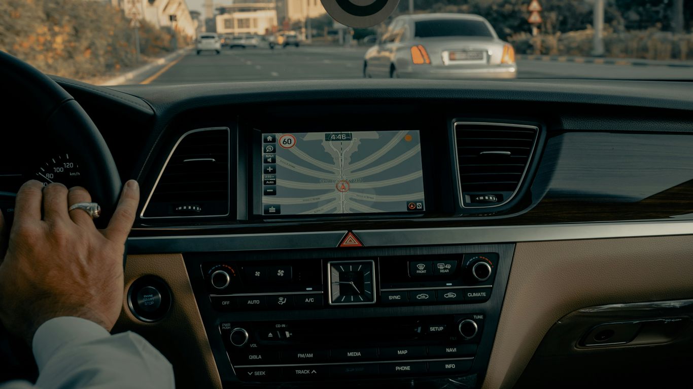 person driving car during daytime