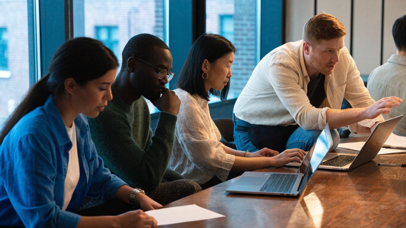SaaS founders reviewing an executive hiring plan