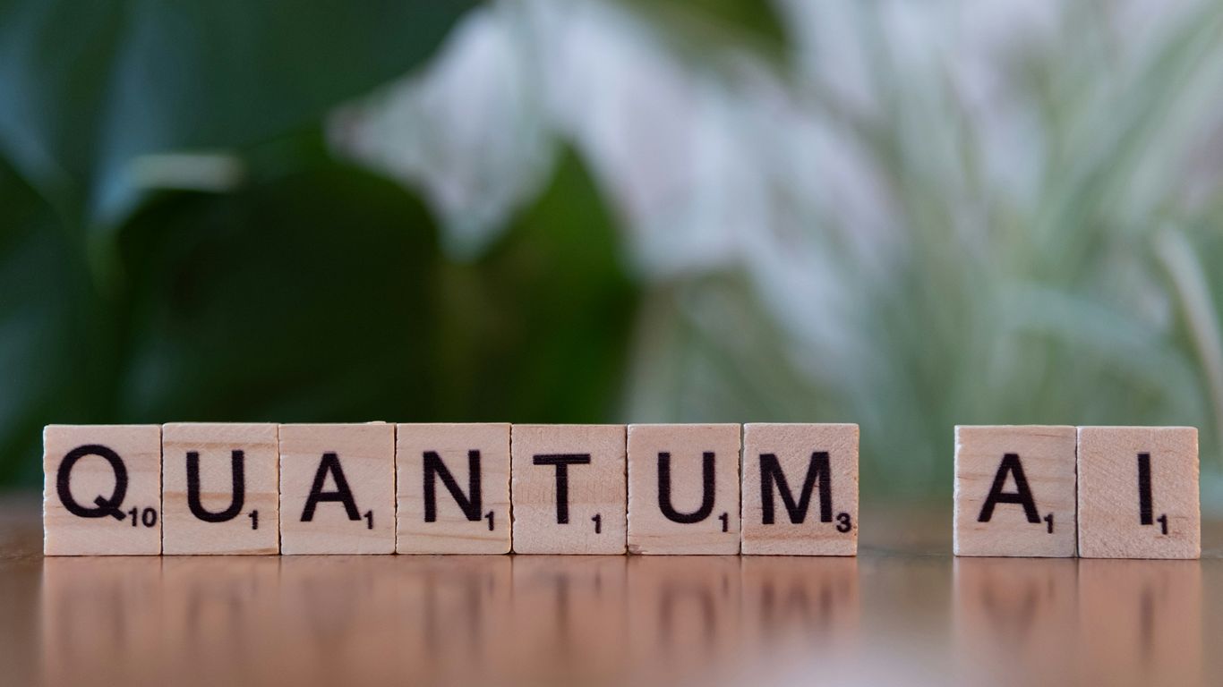 A close up of a wooden block with the word quantum written on it