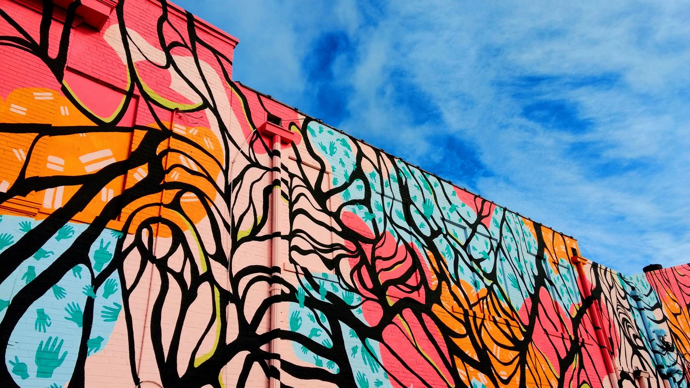 Vibrant colorful murals on the walls of Haji Lane