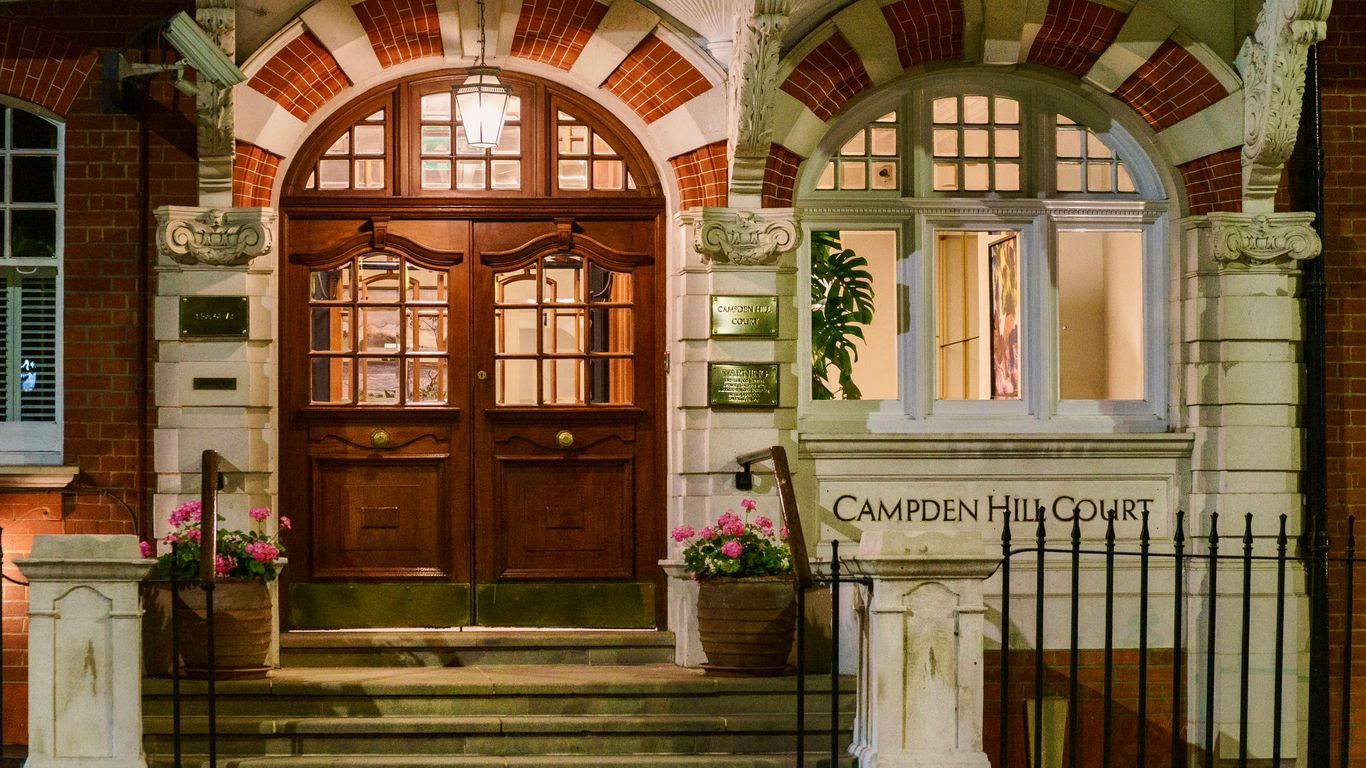 Staff welcoming guests at entrance