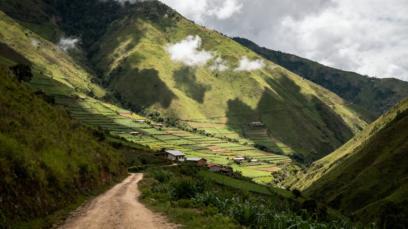 Archival-style rural Colombian landscape with mountain ridges