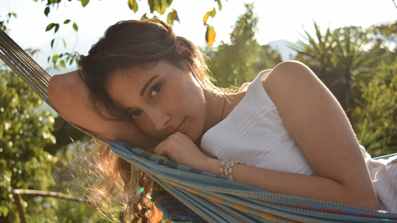 woman in white tank top