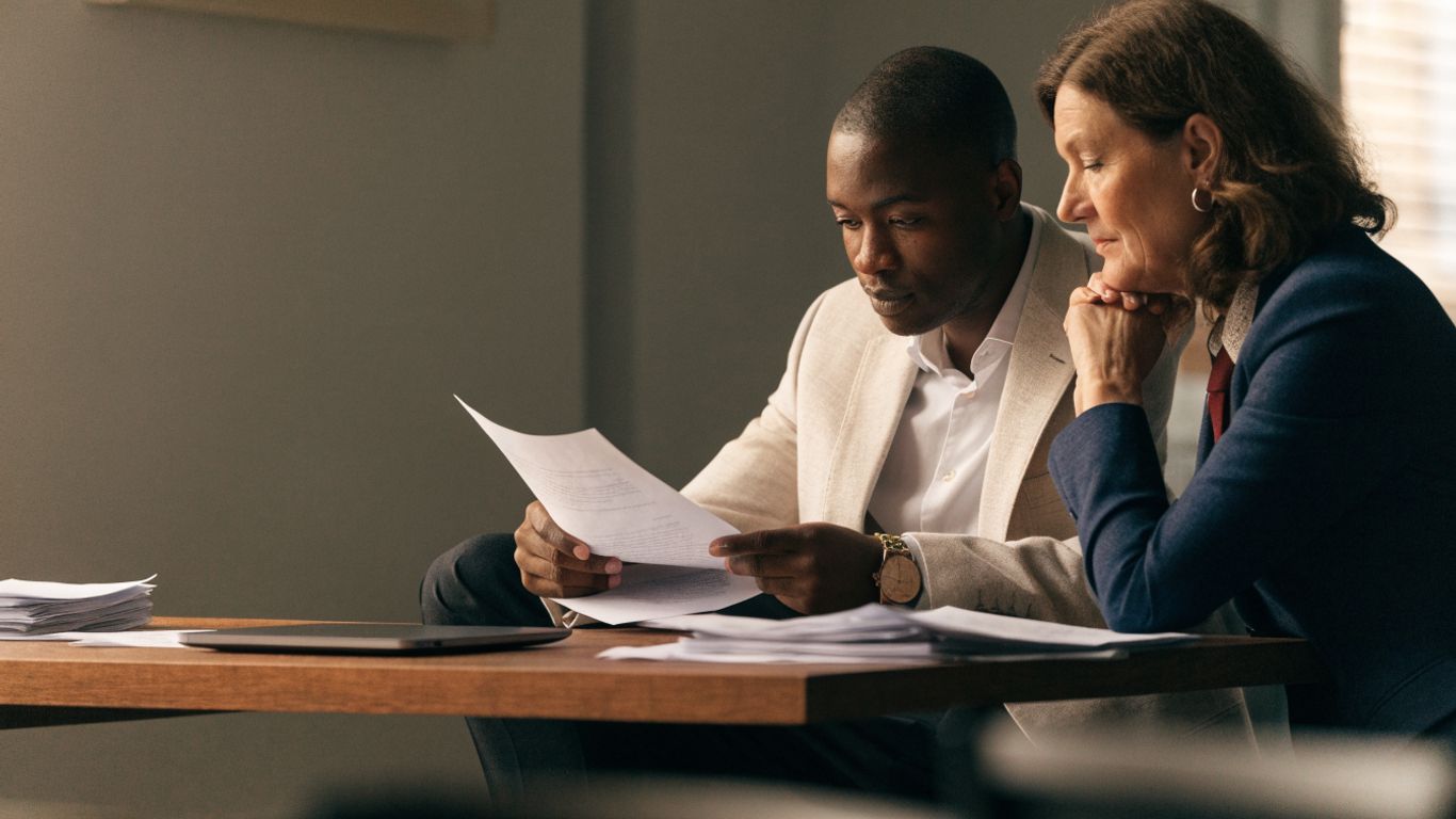 A founder reviewing an engagement plan with an executive