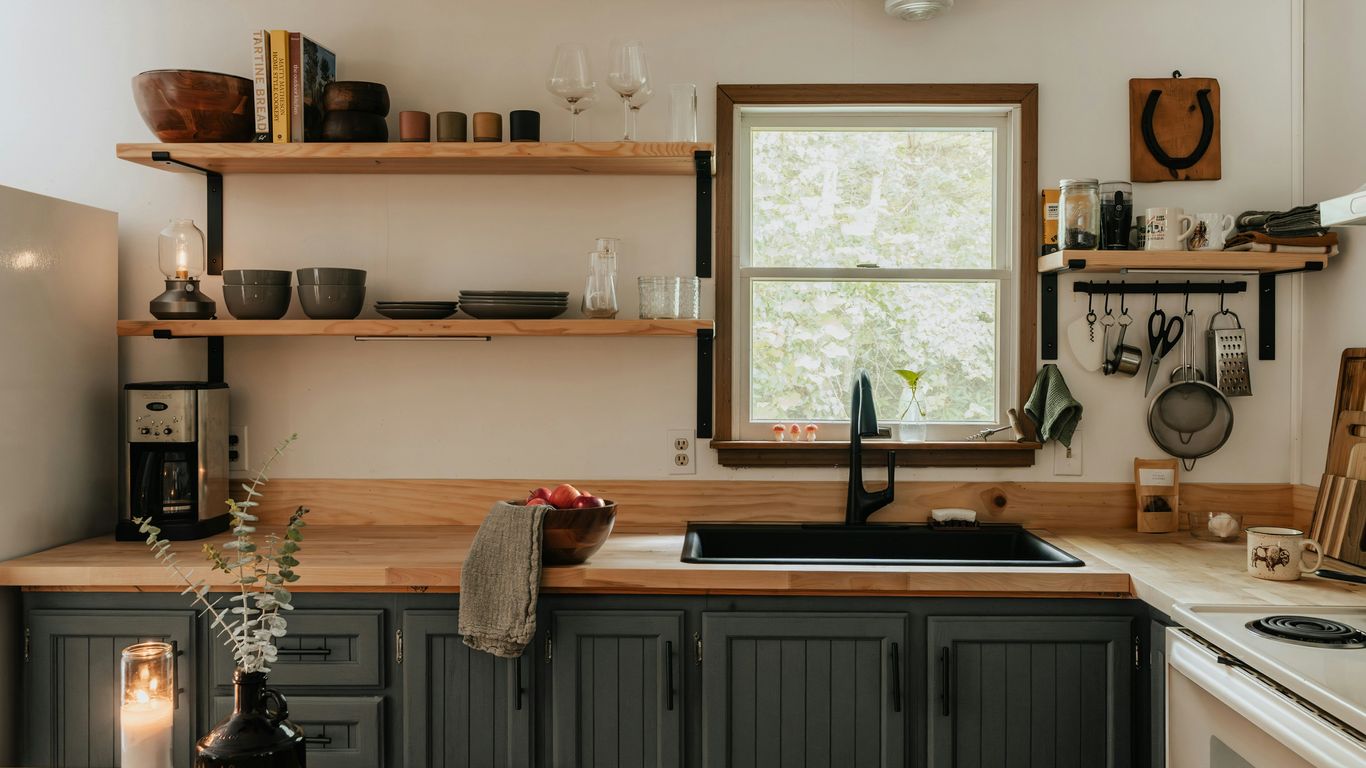 Bright kitchen workspace with professional cameras