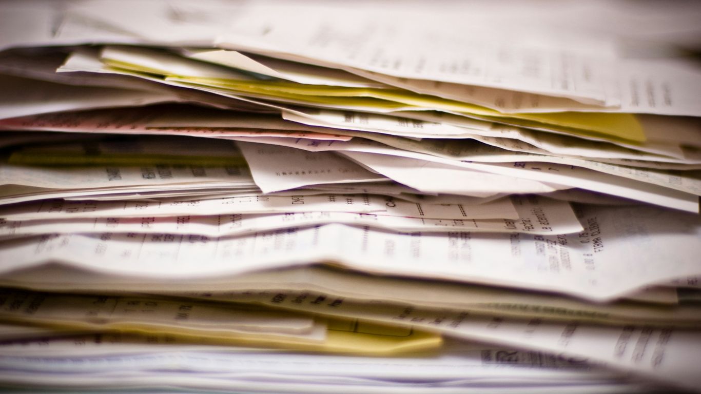 A close-up of a stack of papers.