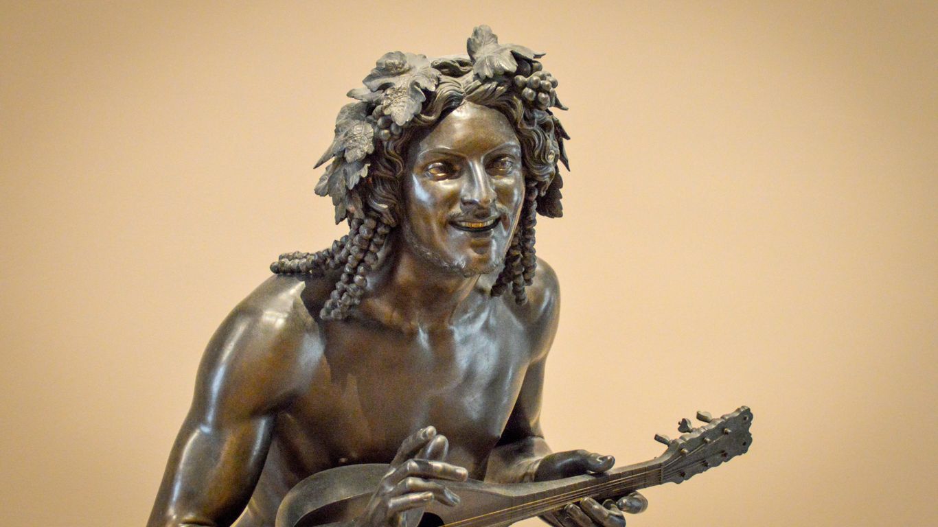 A statue of a man with a guitar